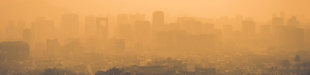 city skyline covered in smog